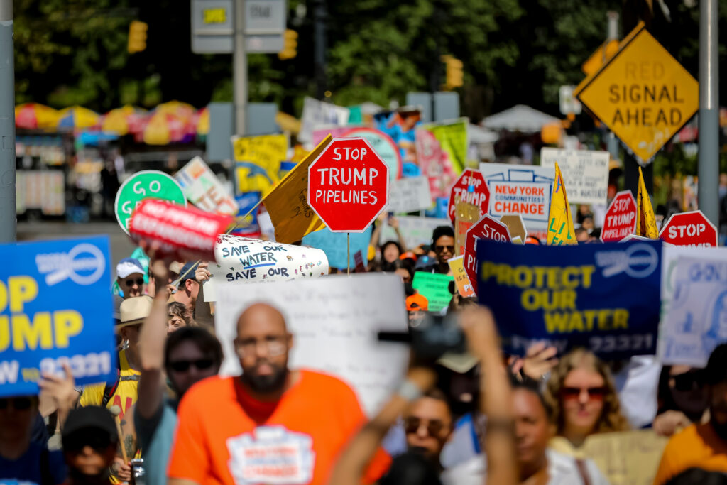 Climate activists march across the Brooklyn Bridge on Aug. 9 to demand that New York Gov. Kathy Hochul stop the construction of the Williams Northeast Supply Enhancement pipeline. Credit: Michael Nigro/Pacific Press/LightRocket via Getty Images