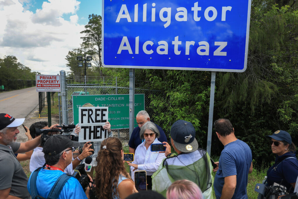 Miami-Dade County Mayor Daniella Levine Cava speaks to the media at the entrance to Alligator Alcatraz on Friday in Ochopee, Fla. Credit: Joe Raedle/Getty Images