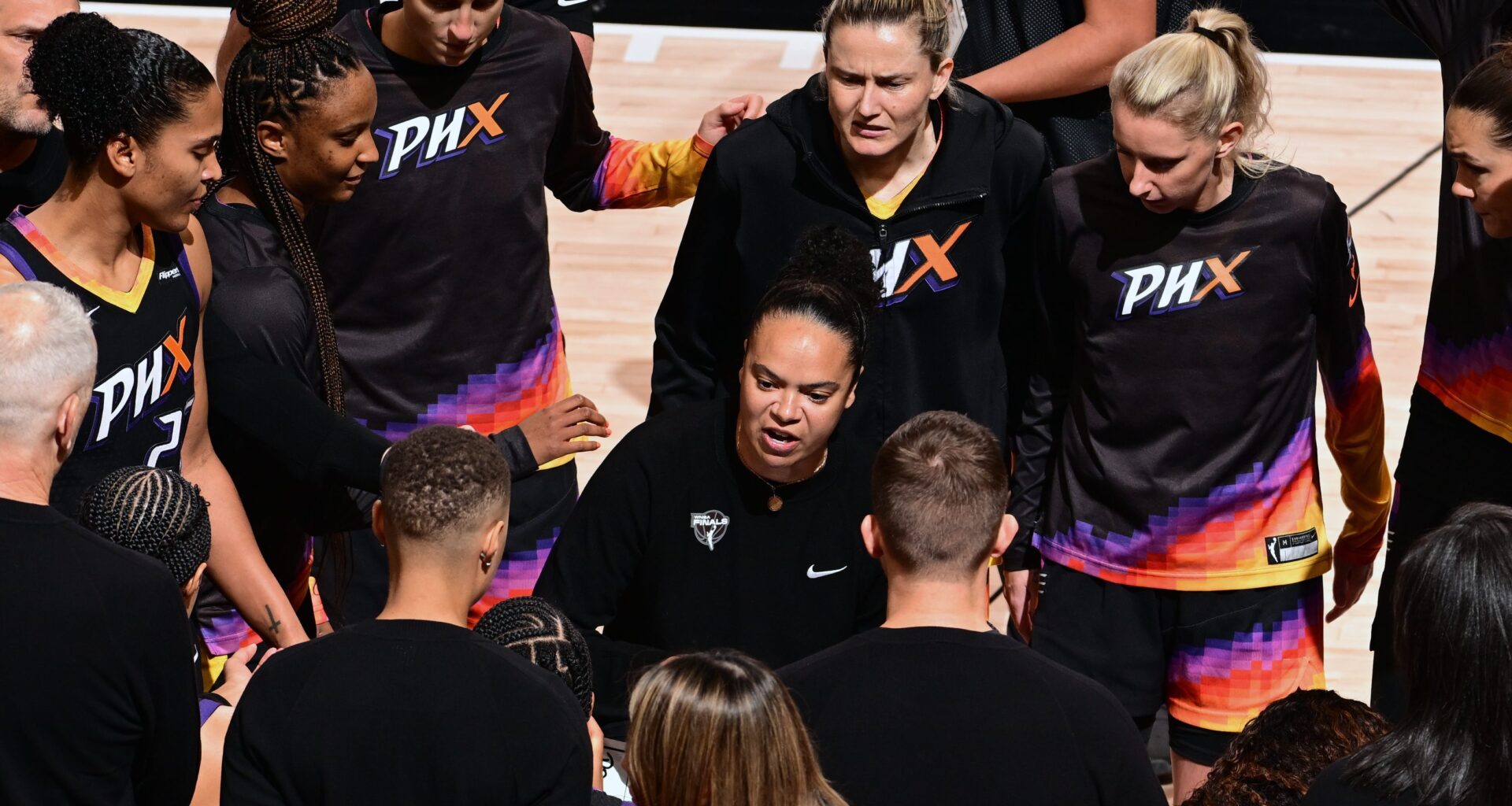 Phoenix Mercury assistant coach Kristi Toliver (center) speaks to the team during Game 3 of the WNBA Finals on Oct. 8, 2025, at PHX Arena in Phoenix.