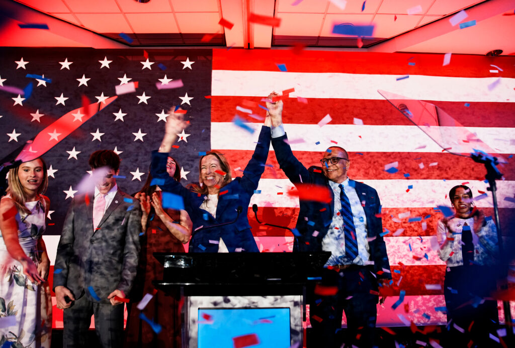 New Jersey Democratic gubernatorial candidate Mikie Sherrill (center-left) celebrates her election night win during a watch party at the Hilton East Brunswick Hotel on Tuesday. Credit: Eduardo Munoz Alvarez/Getty Images