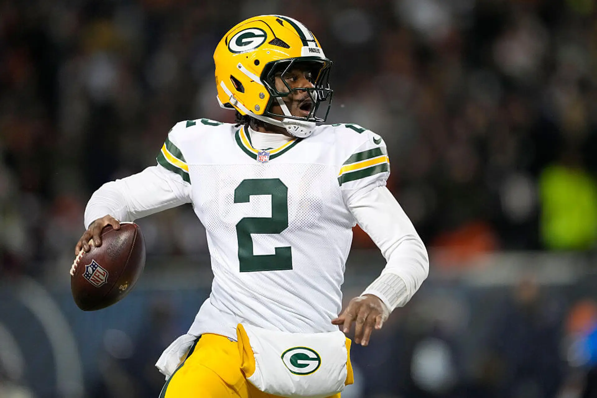 Malik Willis of the Green Bay Packers looks to pass against the Chicago Bears during the third quarter at Soldier Field on Dec. 20, 2025, in Chicago, Ill.