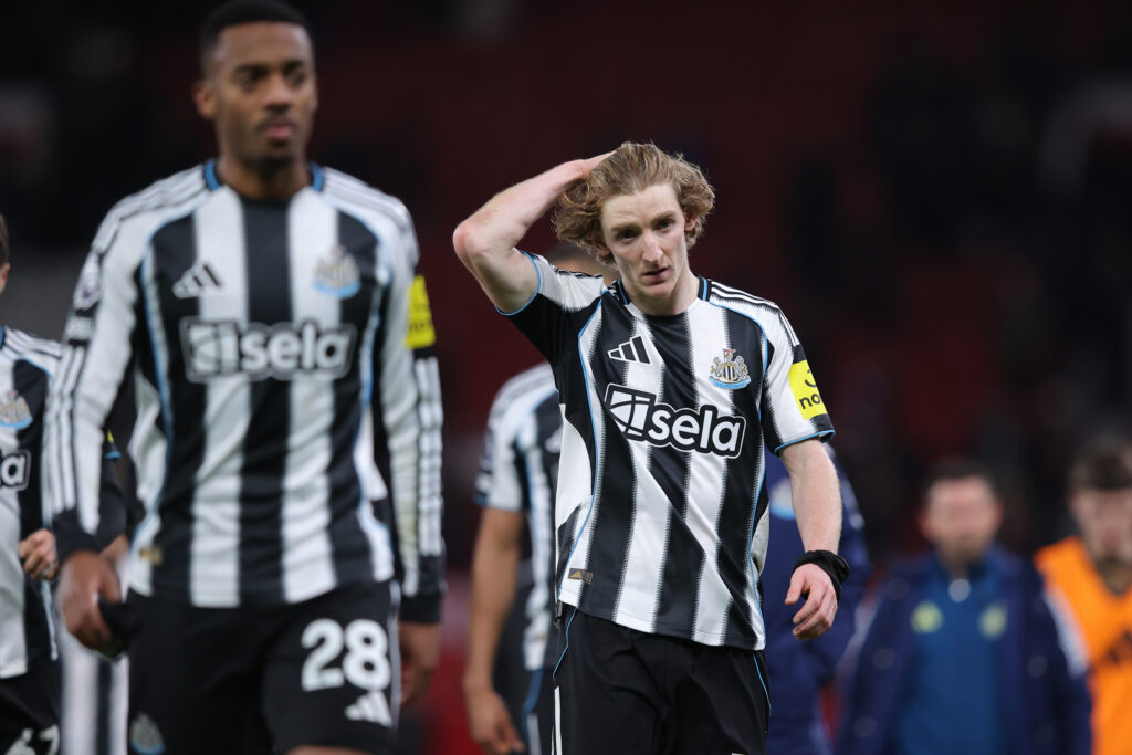 Anthony Gordon looks dejected after Newcastle United lose to Manchester United in the Premier League.