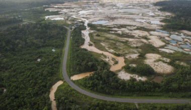 The Interoceanic Highway runs by an illegal gold mining site in La Pampa, Peru. Credit: Ernesto Benavides/AFP via Getty Images