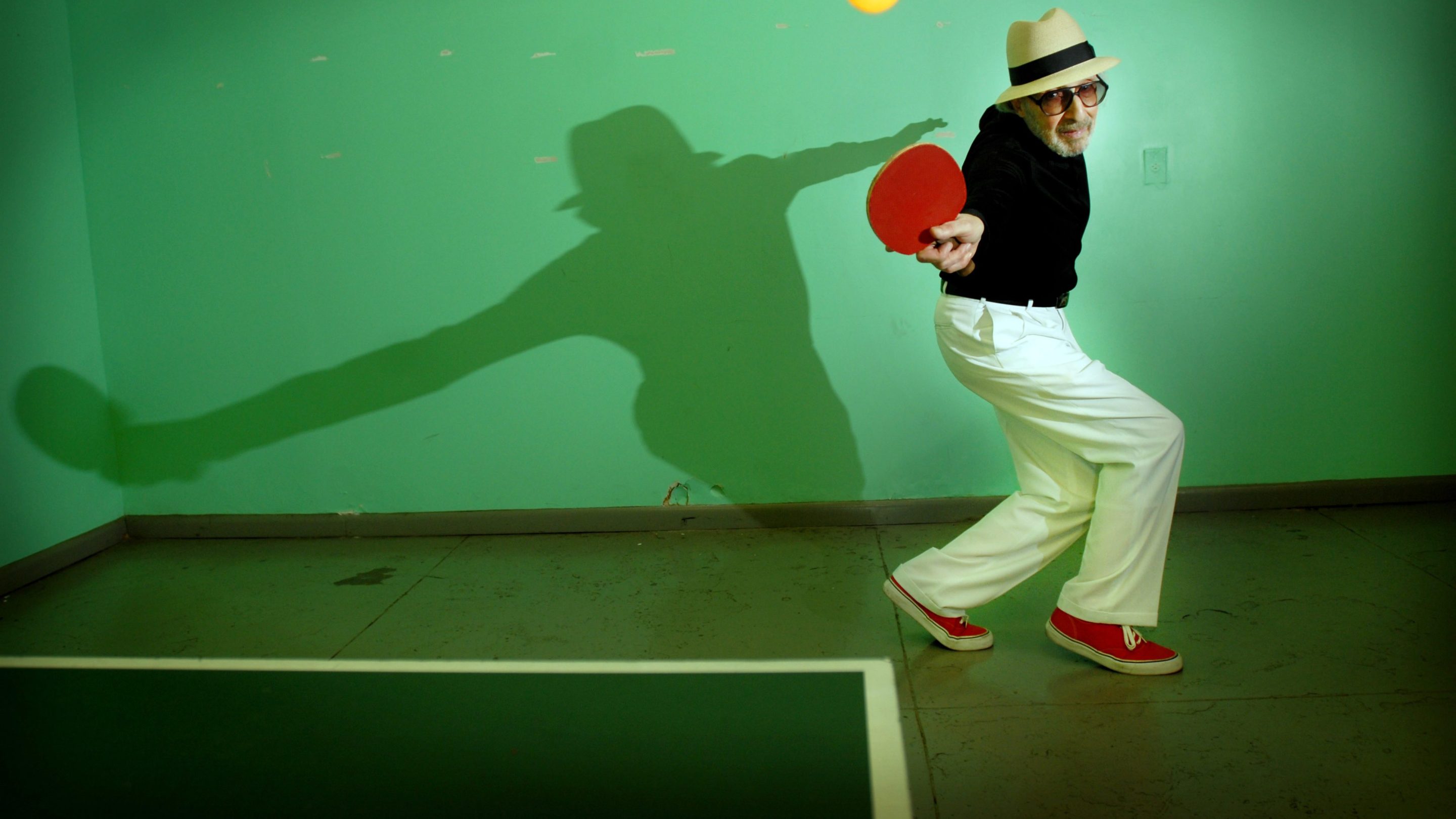Marty Reisman, holder of 18 International and US National table tennis titles, and author of the 1974 book "The Money Player" in which he described his life traveling the world, playing high-stakes matches. Reisman won the 1997 United States National Hardbat championship. Now at age 77, he is probably the oldest person ever to win an open US national title in a racquet sport. (Photo by Neville Elder/Corbis via Getty Images)