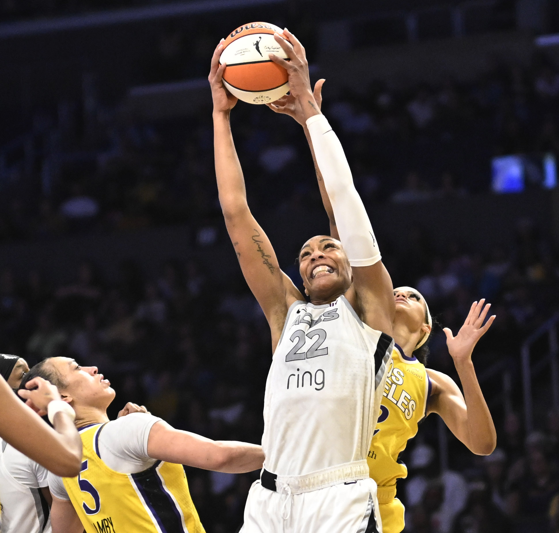 Las Vegas Aces center A’ja Wilson grabs a rebound over...