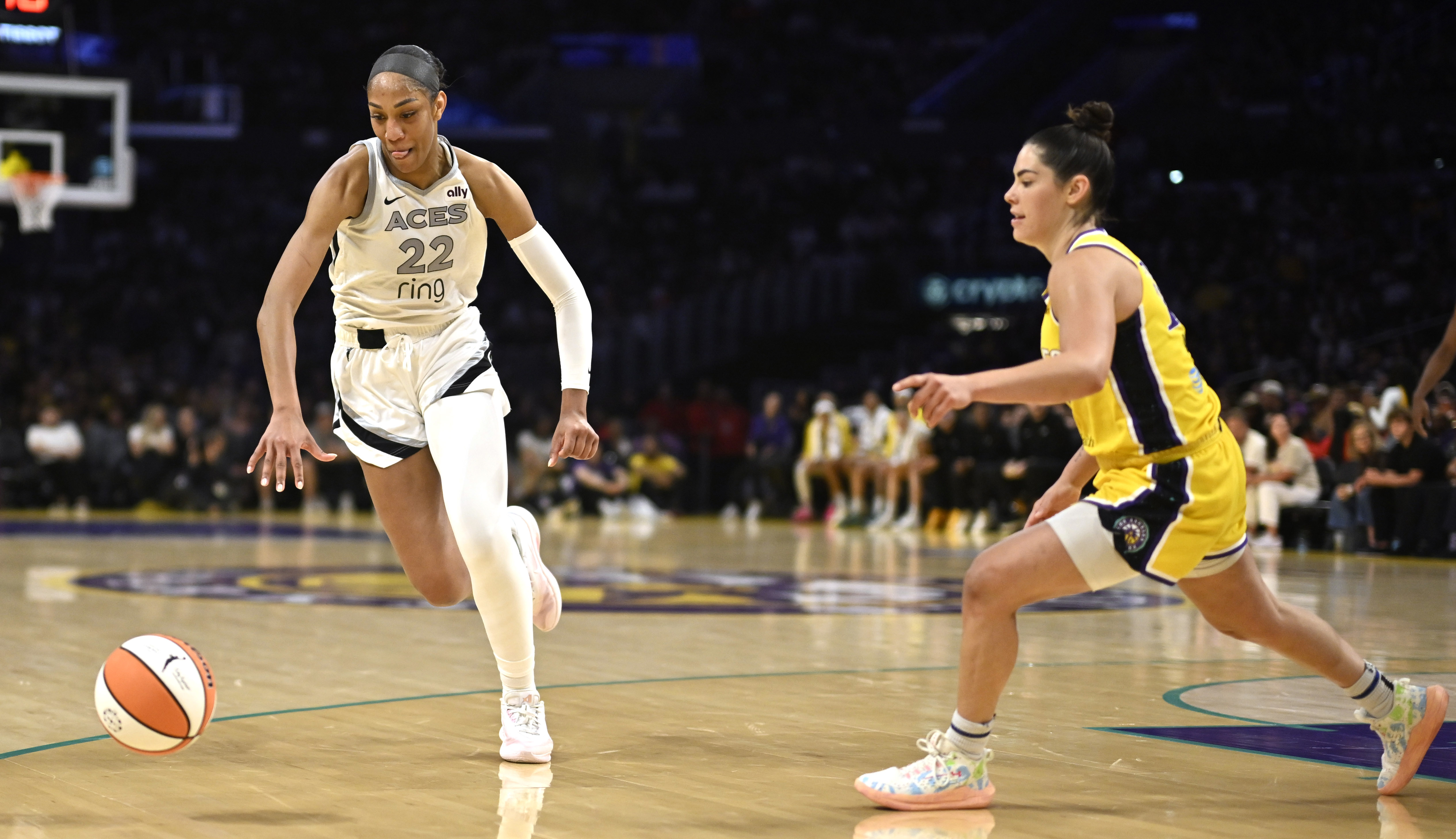Las Vegas Aces center A’ja Wilson chases a loose ball...