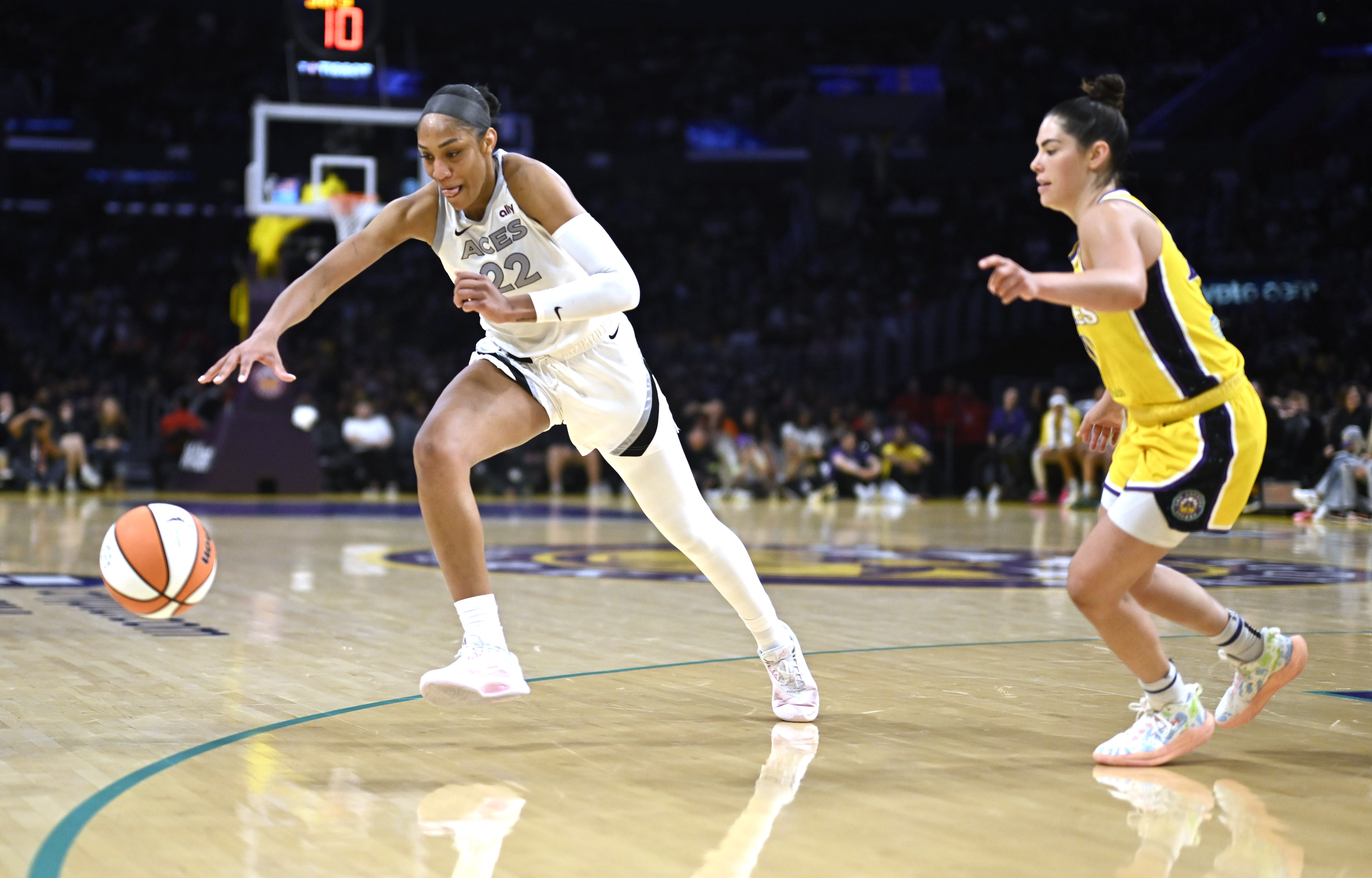 Las Vegas Aces center A’ja Wilson chases a loose ball...
