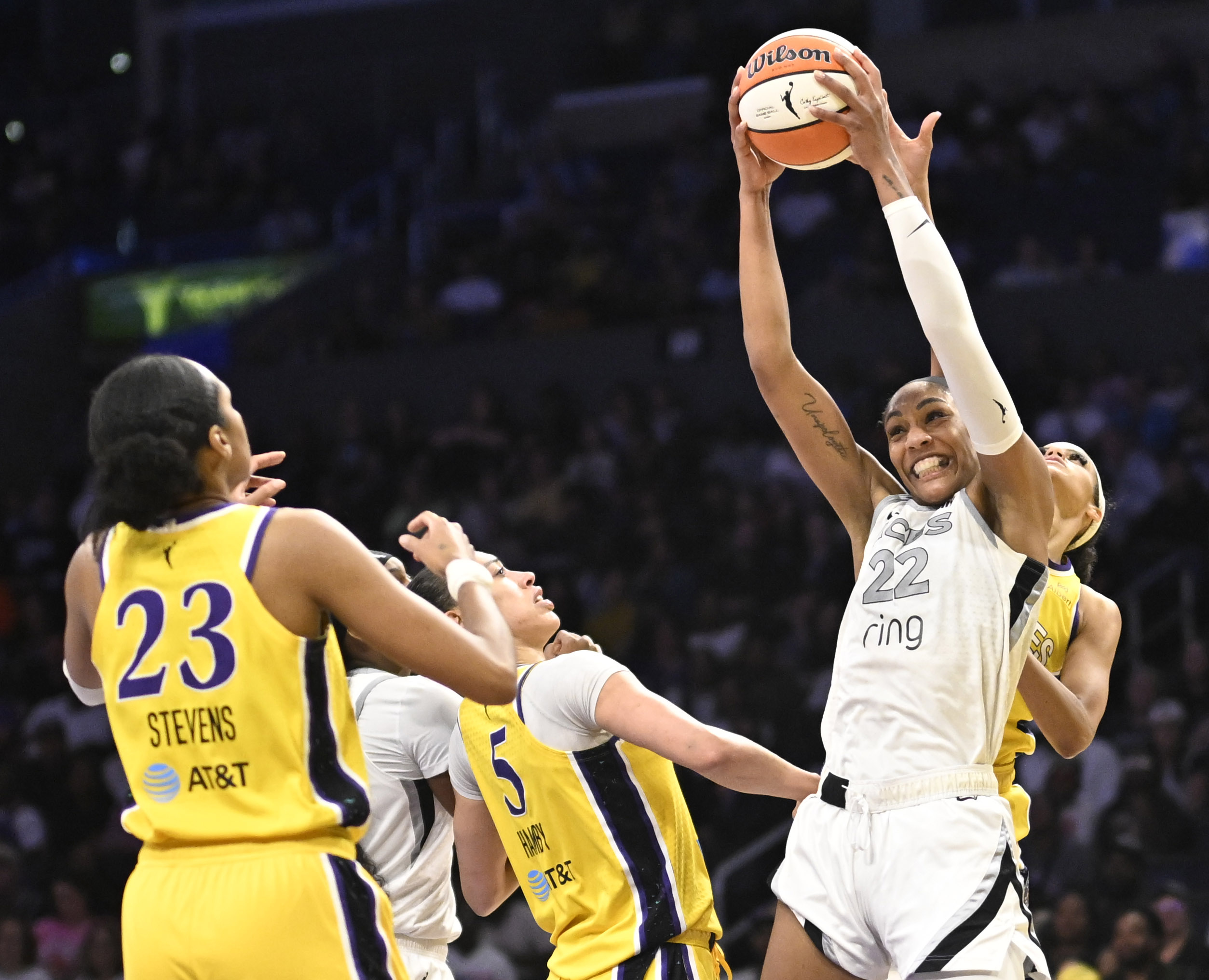 Las Vegas Aces center A’ja Wilson grabs a rebound over...