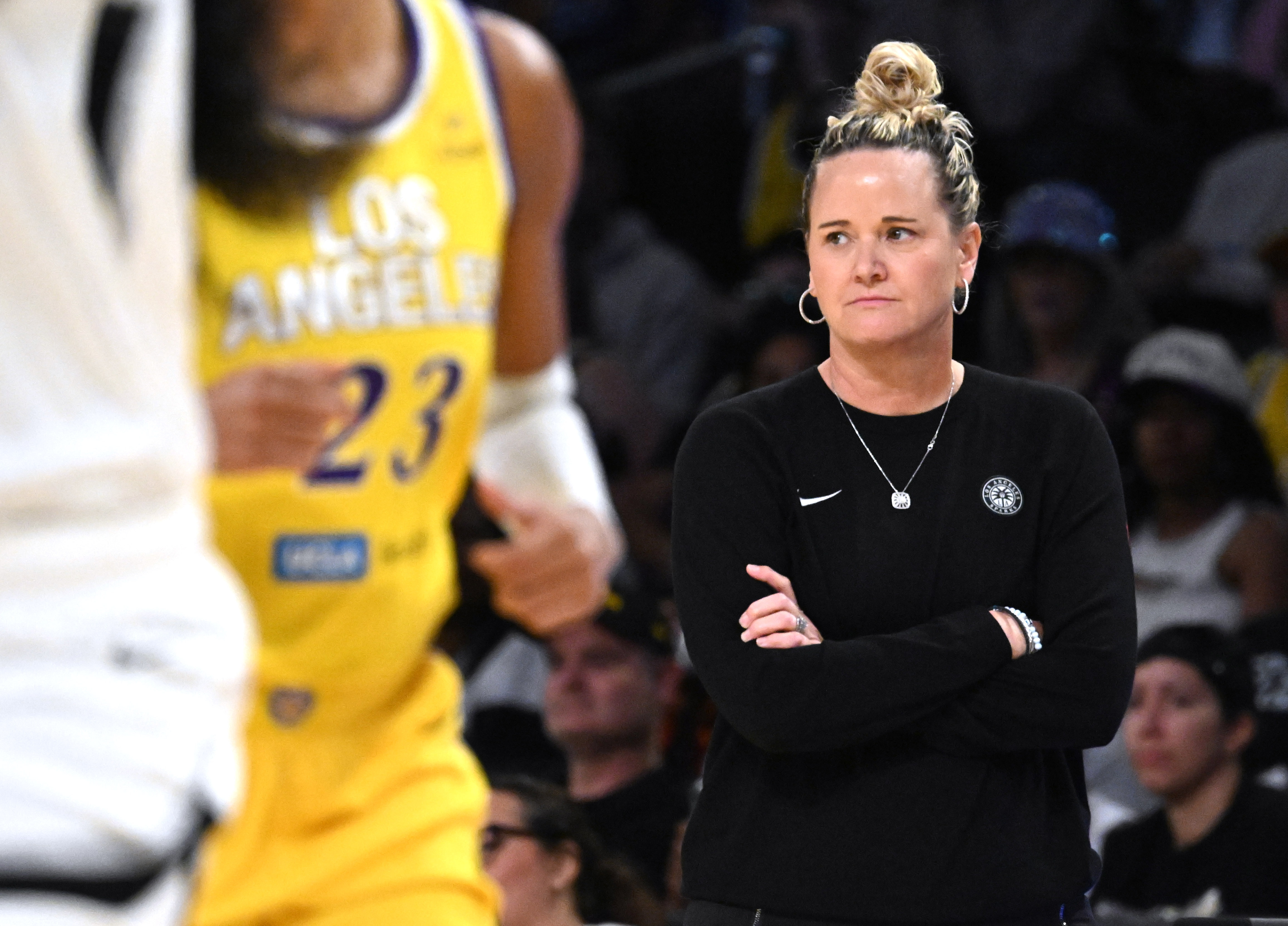 Sparks head coach Lynne Roberts watches from the sideline during...