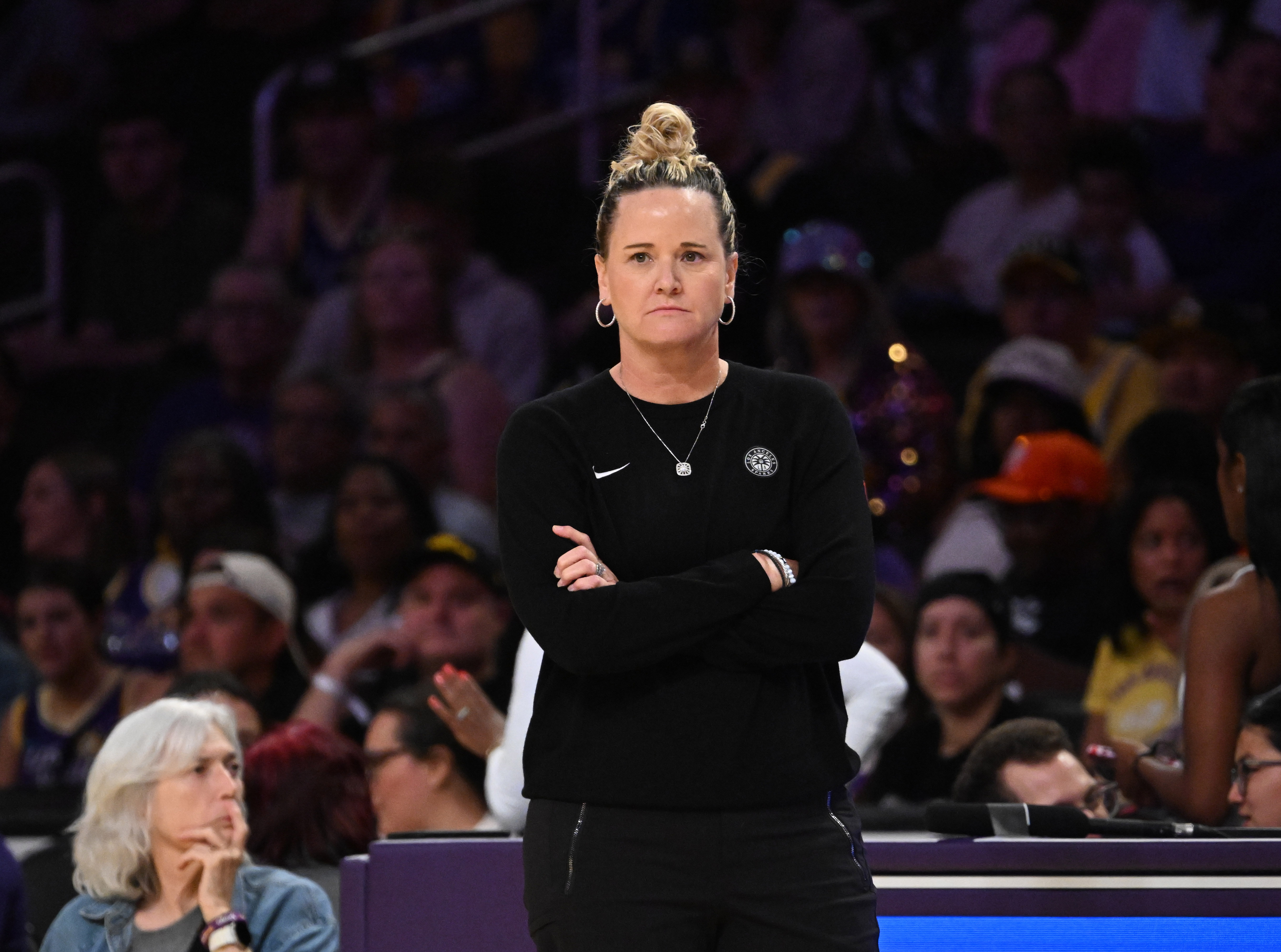 Sparks head coach Lynne Roberts watches from the sideline during...