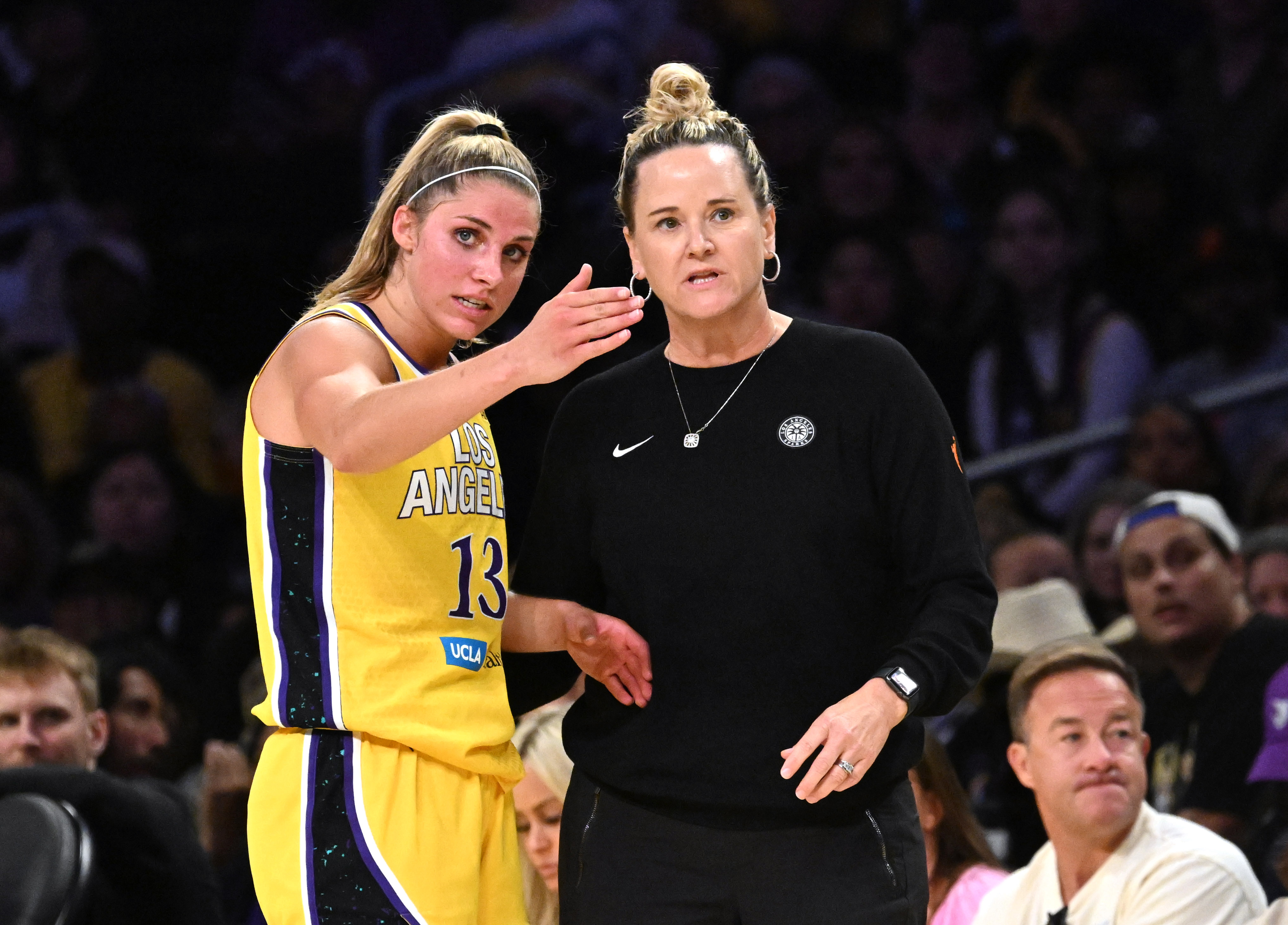 Sparks head coach Lynne Roberts talks with guard Sarah Ashlee...