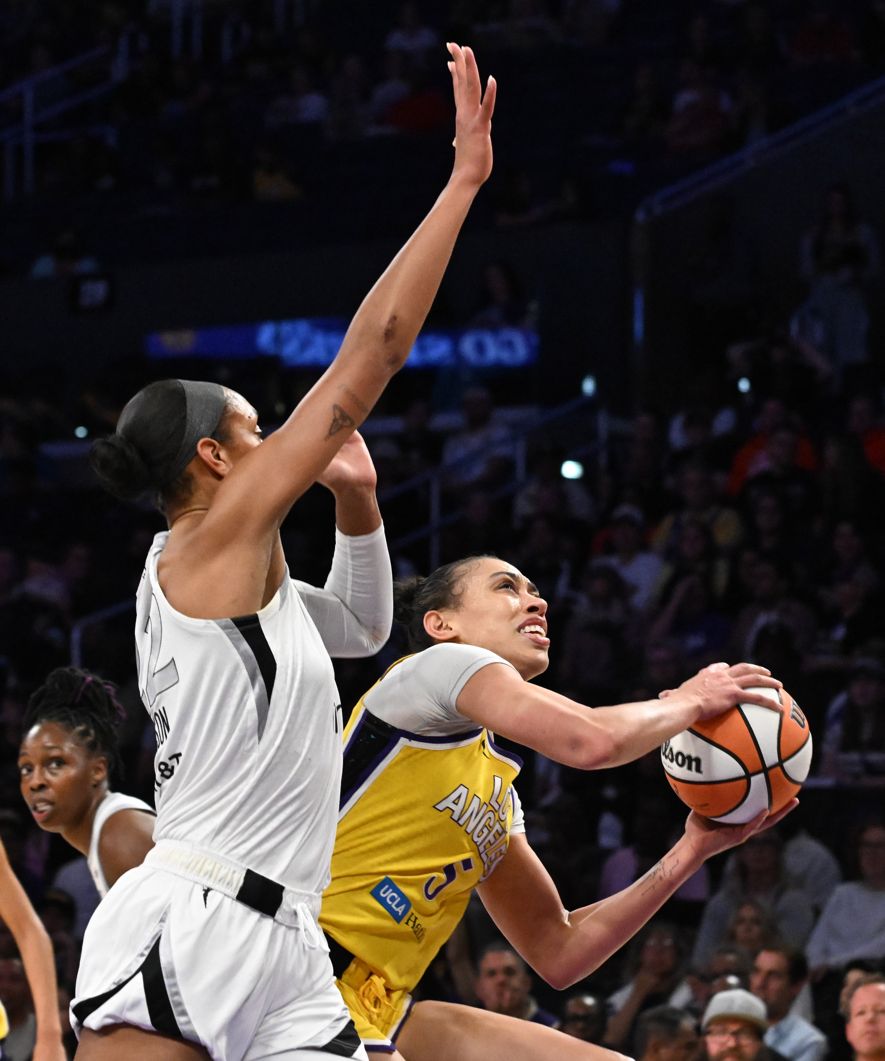Sparks forward Dearica Hamby drives to the basket as Las...
