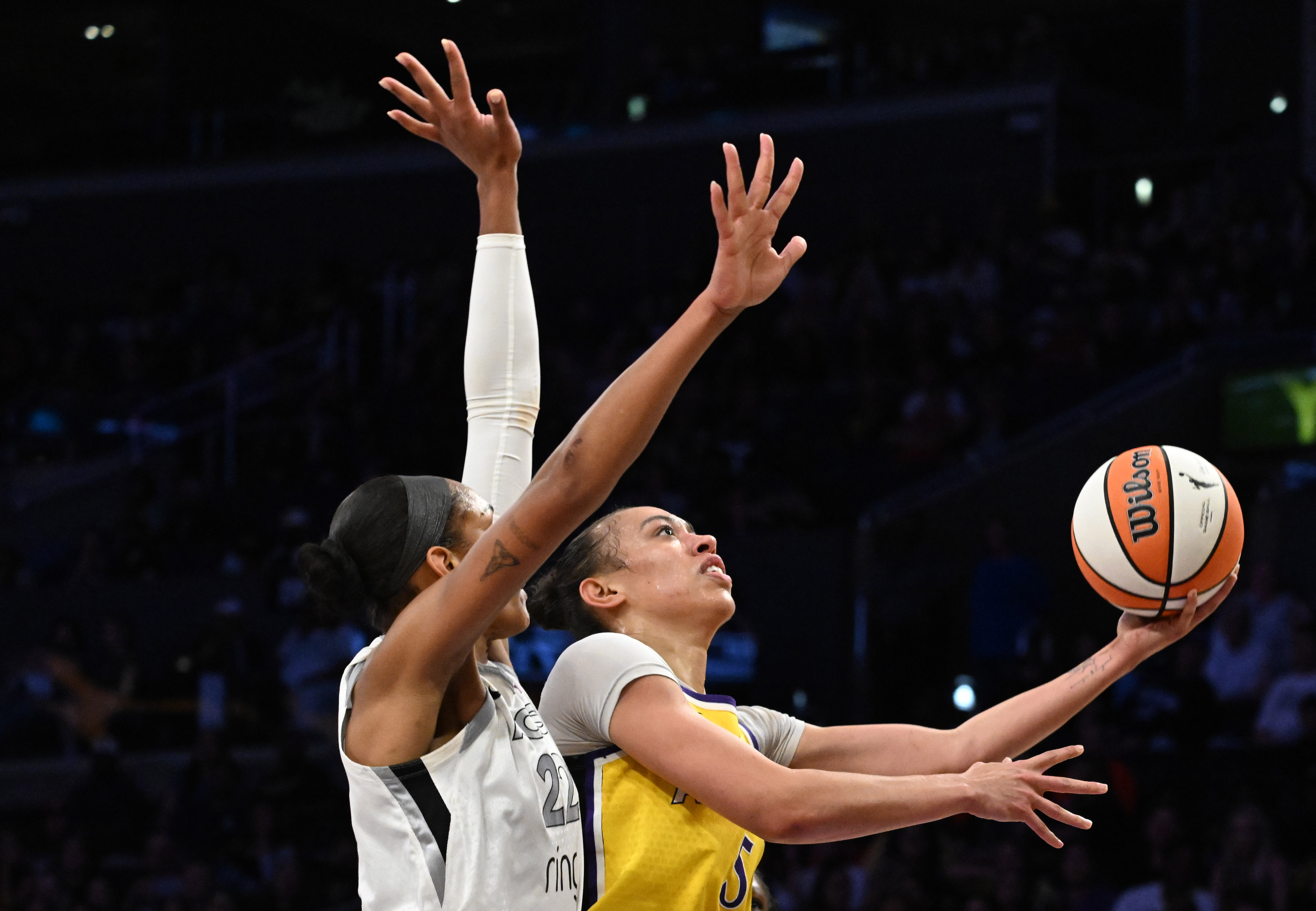 Sparks forward Dearica Hamby drives to the basket as Las...