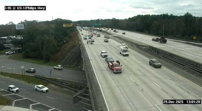 Crash involving motorcycle causing backups on I-95 North at Philips Highway