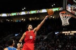 Portland Trail Blazers forward Toumani Camara drives to the basket against the Orlando Magic during the second half of an NBA basketball game Tuesday Dec. 23, 2025, in Portland, Ore.