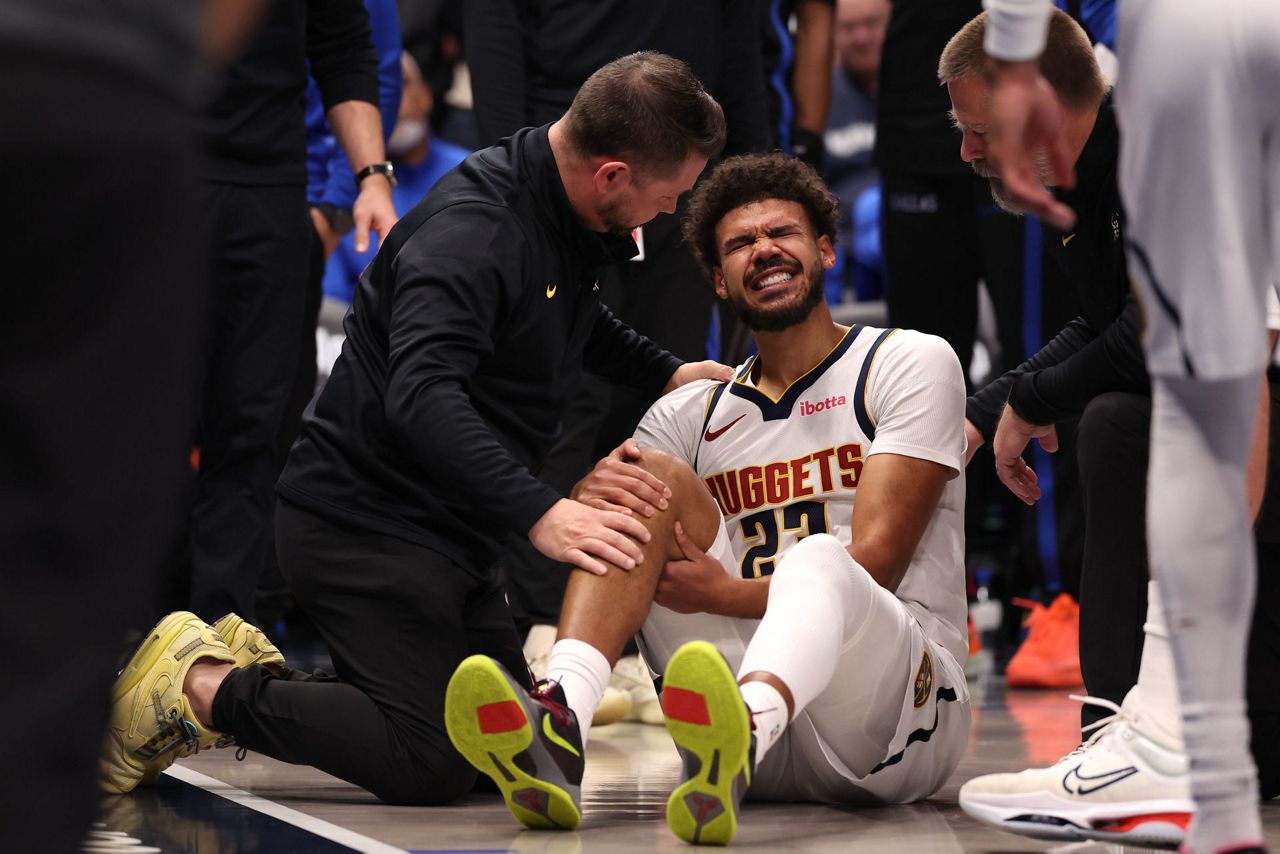 Nuggets forward Cameron Johnson avoids major knee injury but will miss a few games, AP source says