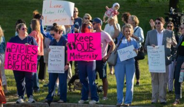 Demonstrators rallied in front of UMass Memorial Health's Leominster campus, HealthAlliance-Clinton Hospital, in 2023, protesting the closure of the hospital's maternity ward.