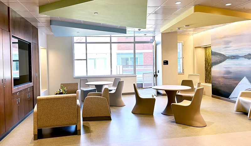 A gathering space in the new inpatient behavioral health unit overlooks the secure outdoor recreation area. Photo by Kelly Tracer, UCHealth.