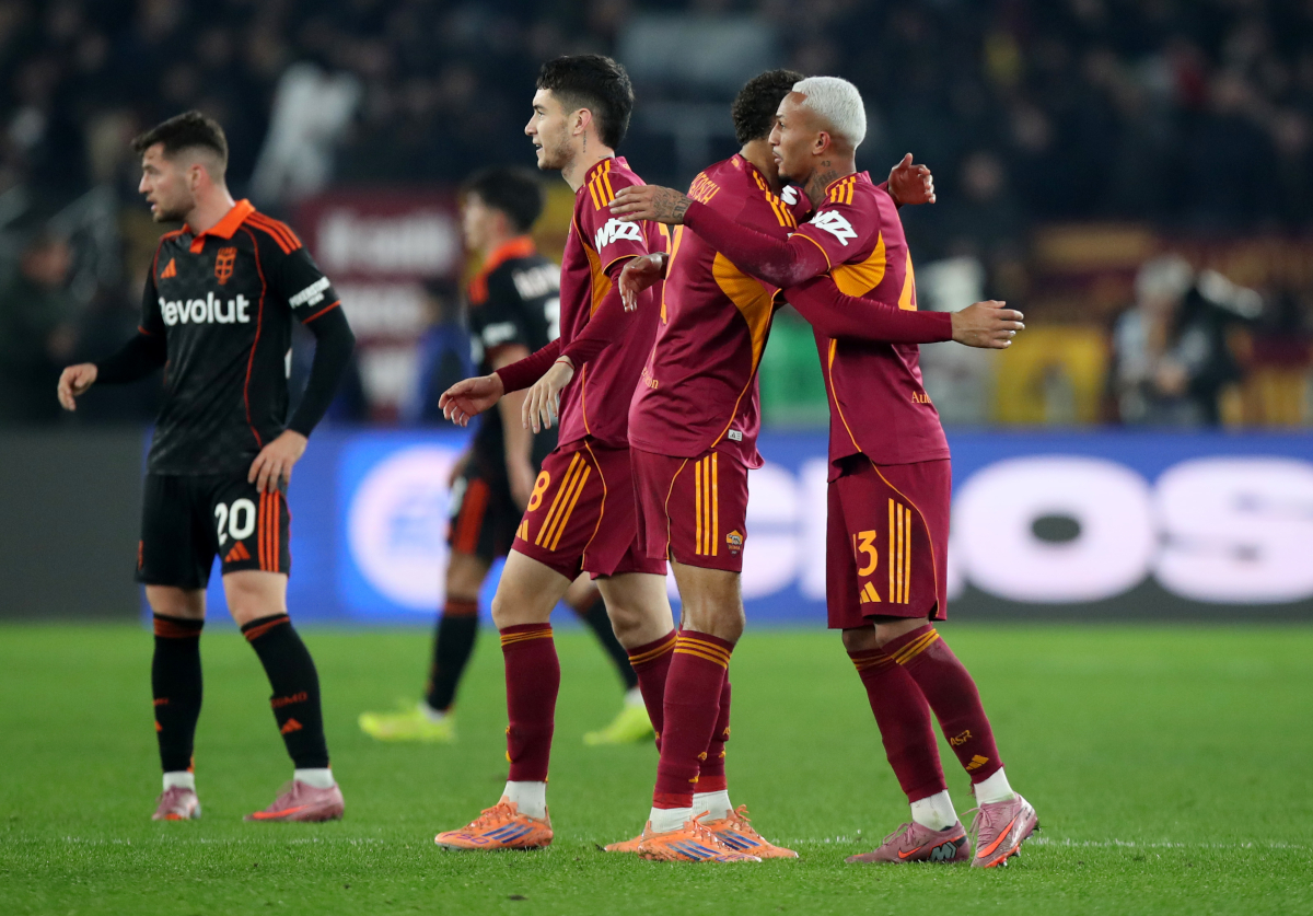 ROME, ITALY - DECEMBER 15: Wesley of AS Roma (R) celebrates with teammate Devyne Rensch after scoring his team's first goal during the Serie A match between AS Roma and Como 1907 at Stadio Olimpico on December 15, 2025 in Rome, Italy. (Photo by Paolo Bruno/Getty Images)
