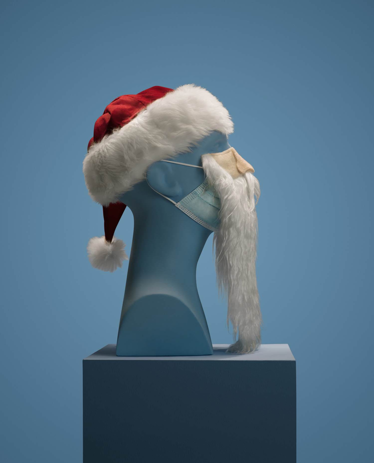 The effects of Vividon relighting plug-in on a mannequin wearing a Santa hat and beard