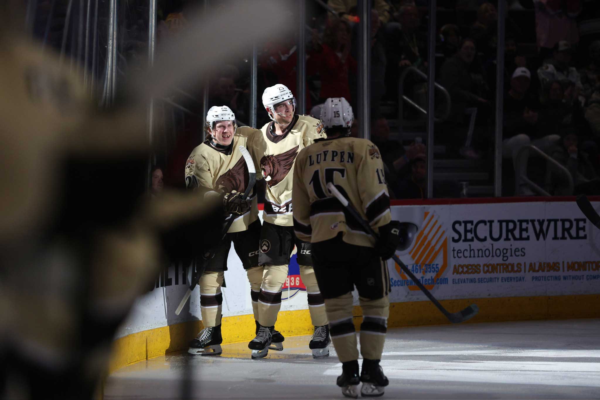 Andrew Cristall celebrates with Brett Leason