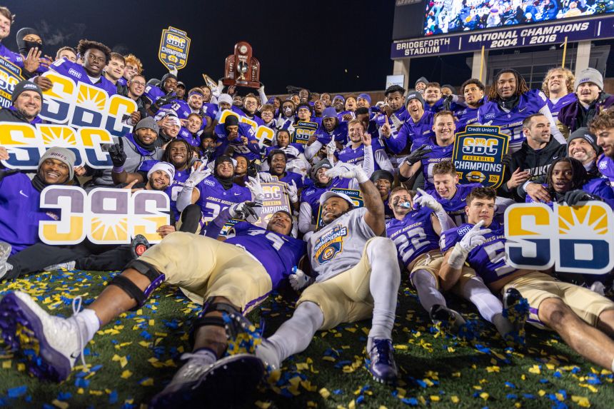 James Madison celebrates its Sun Belt title on December 5.