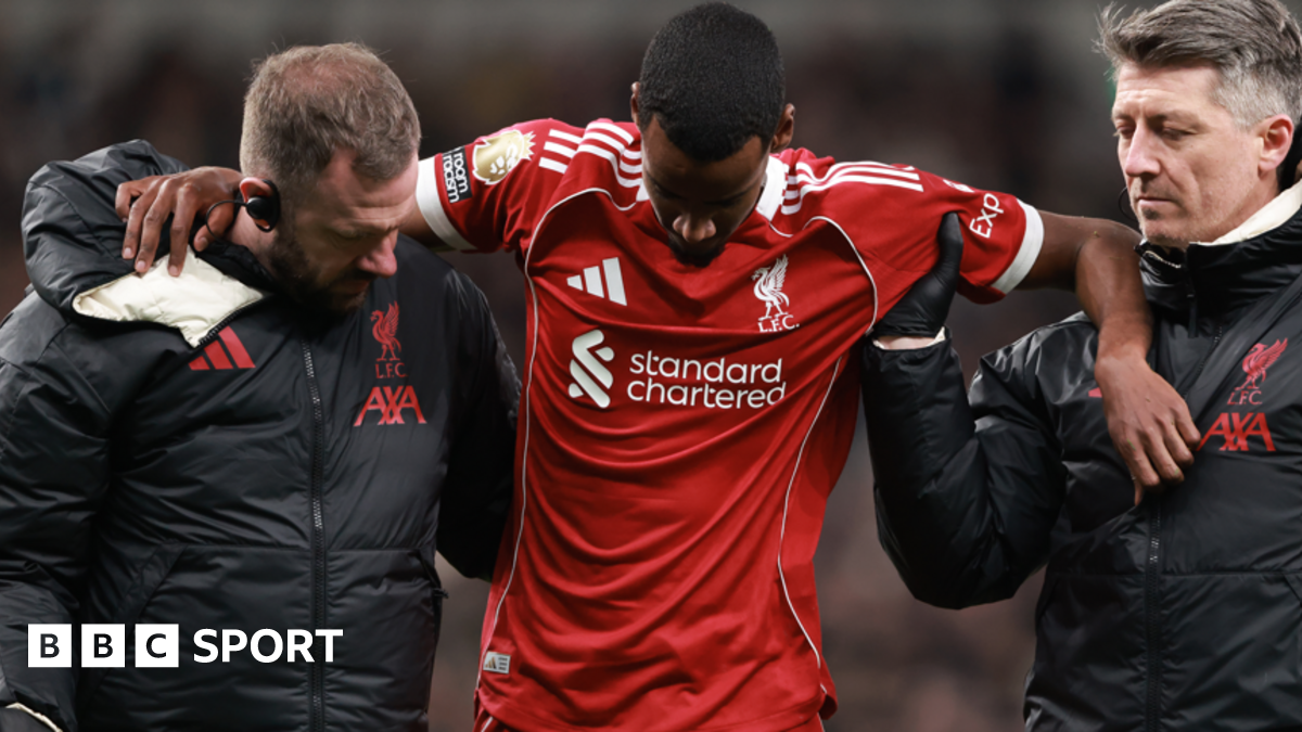 Alexander Isak is helped off the pitch after being injured while scoring for Liverpool in the Premier League win at Tottenham
