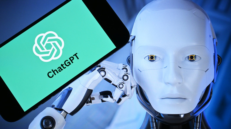 A robotic figure next to a phone with ChatGPT's logo on screen