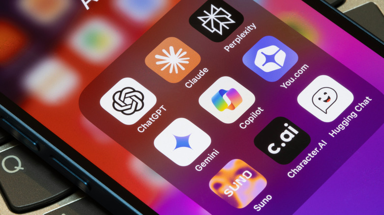 iOS folder filled with various app icons on an iPhone