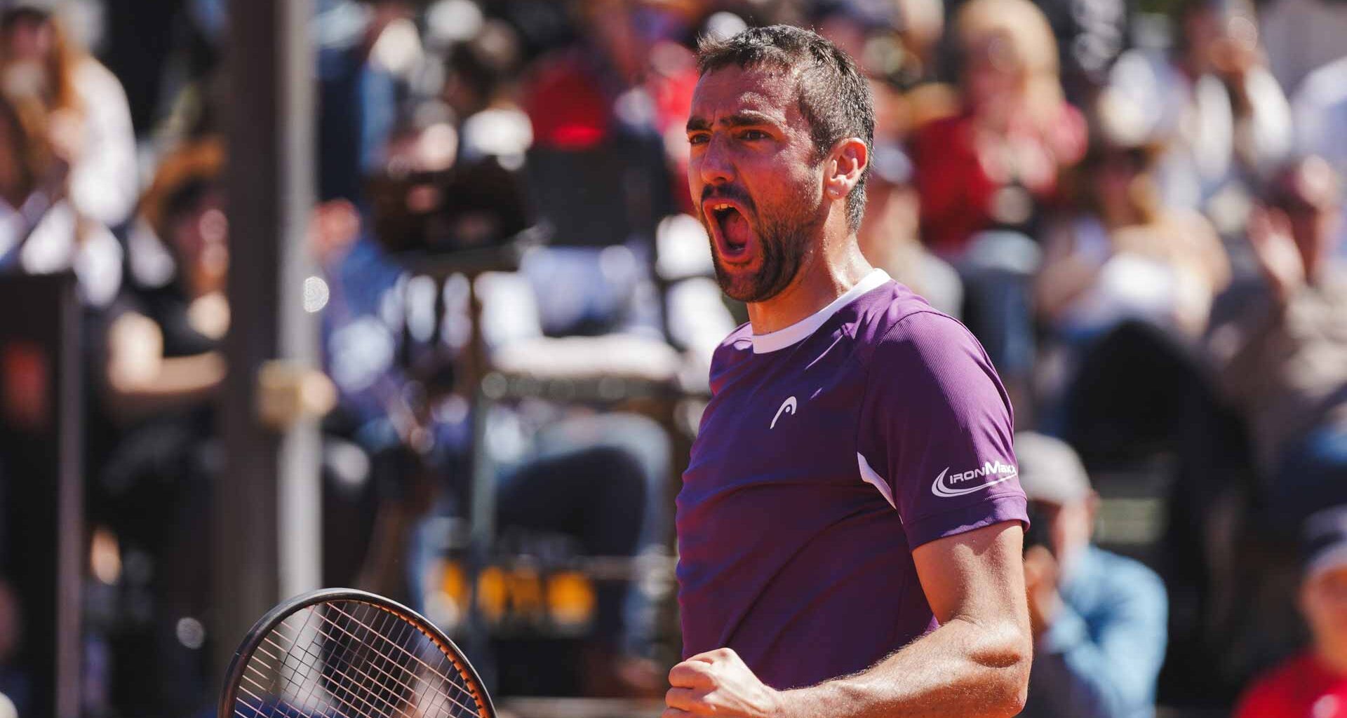 Marin Cilic celebrates winning the ATP Challenger 100 event in Girona, Spain.