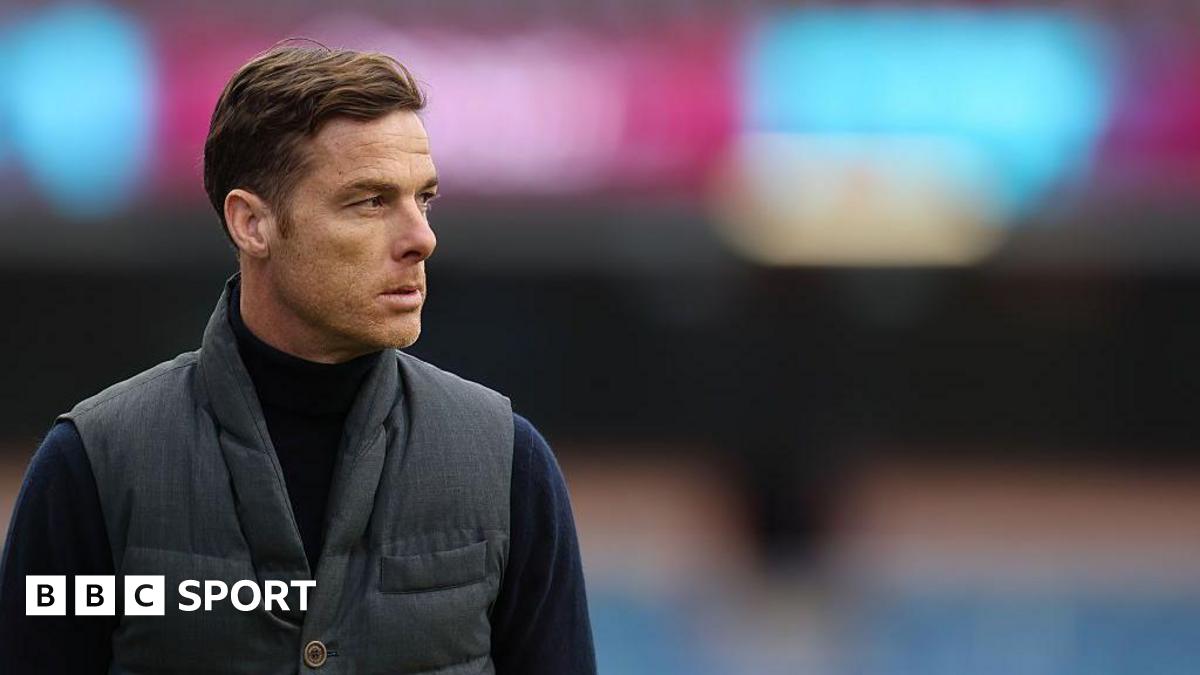 Scott Parker looks on from the touchline