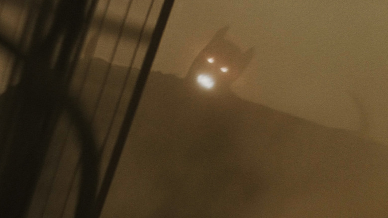 Batman is seen as a demon flying over Gotham in Batman Begins