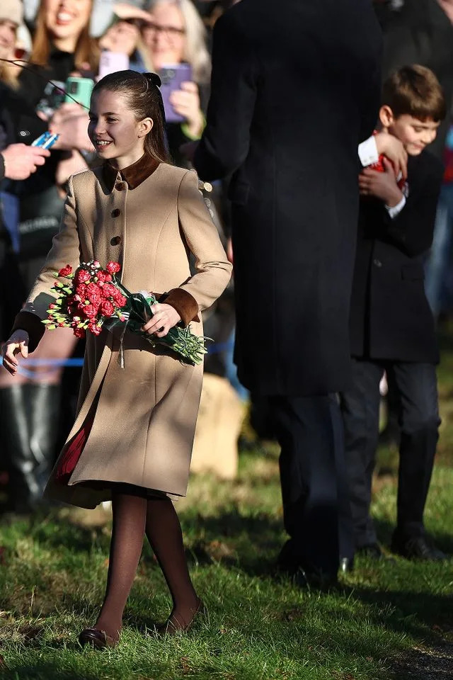 HENRY NICHOLLS / AFP via Getty Princess Charlotte and Prince Louis on Christmas 2025