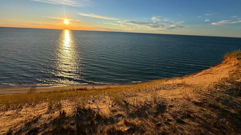Shoreline of Arcadia Bluffs golf course at sunset