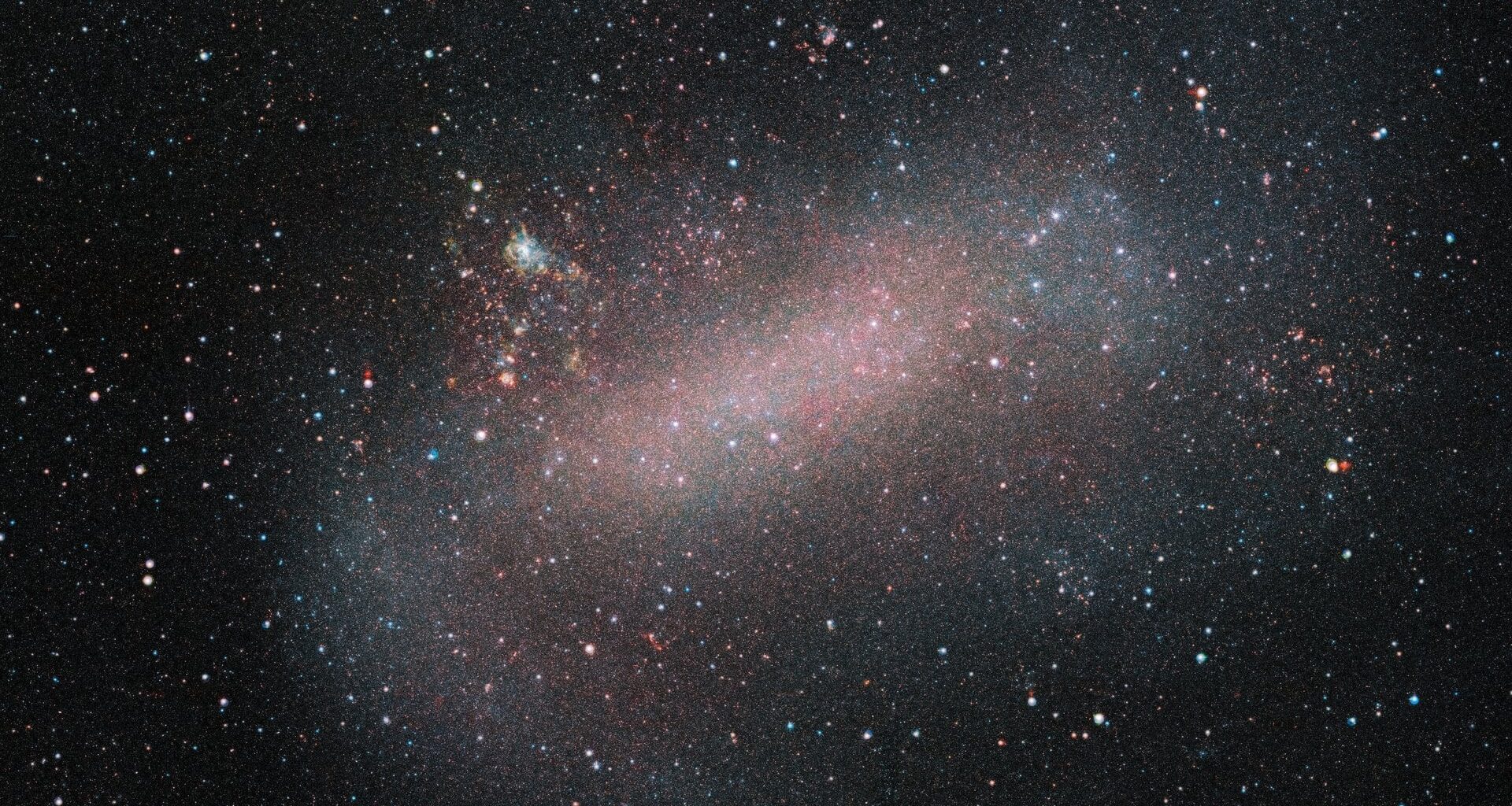 ESO’s VISTA telescope reveals a remarkable image of the Large Magellanic Cloud, one of our nearest galactic neighbours. Credit: ESO/VMC Survey