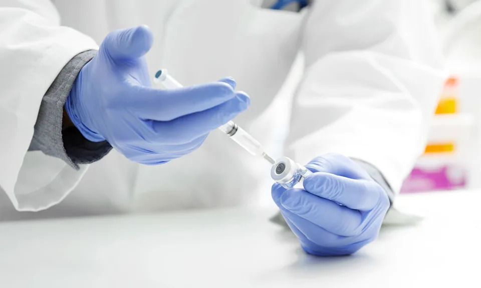 Getty Stock image of a doctor preparing a vaccine.