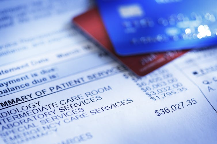 Close-up of medical bill and credit cards