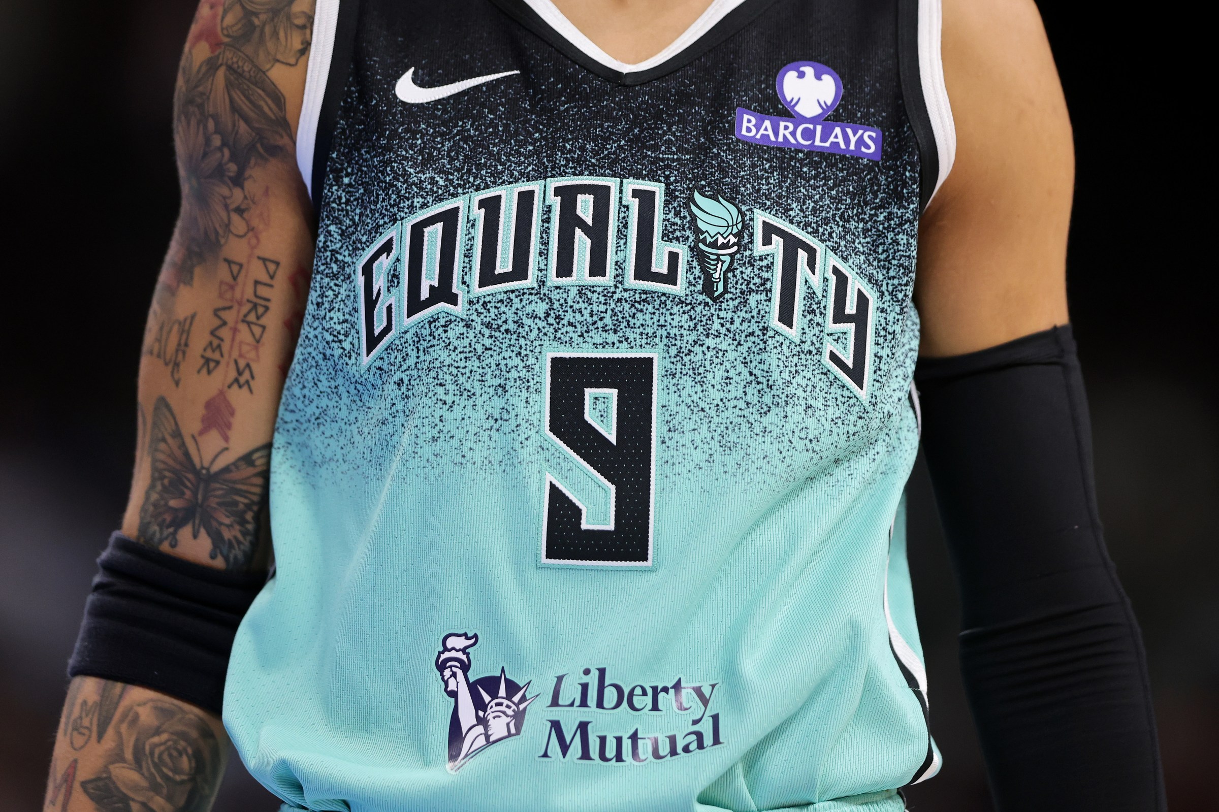 The Liberty Mutual logo does not overwhelm New York Liberty’s jersey, worn here by Natasha Cloud.