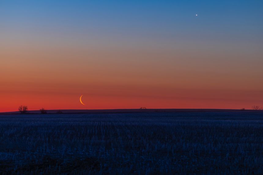A crescent moon and bright Venus can be seen over southern Alberta in April.