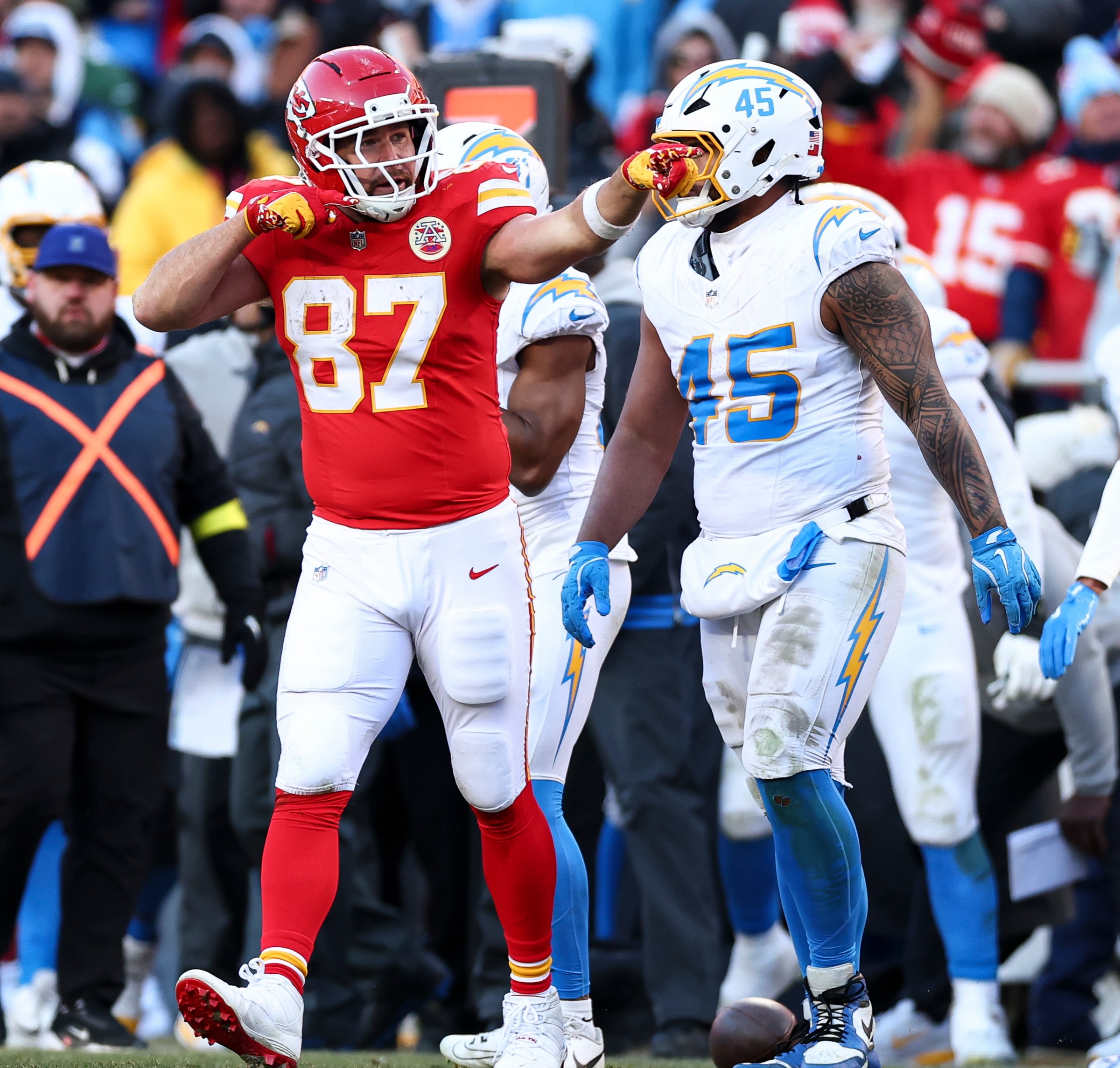 KANSAS CITY, MISSOURI - DECEMBER 14: Travis Kelce #87 of the Kansas City Chiefs celebrates after a play during the fourth quarter of the NFL football game against the Los Angeles Chargers at GEHA Field at Arrowhead Stadium on December 14, 2025 in Kansas City, Missouri. (Photo by Kevin Sabitus/Getty Images)