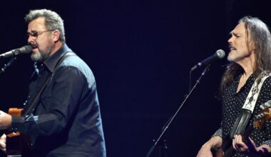 Vince Gill and Timothy B. Schmit performing with The Eagles