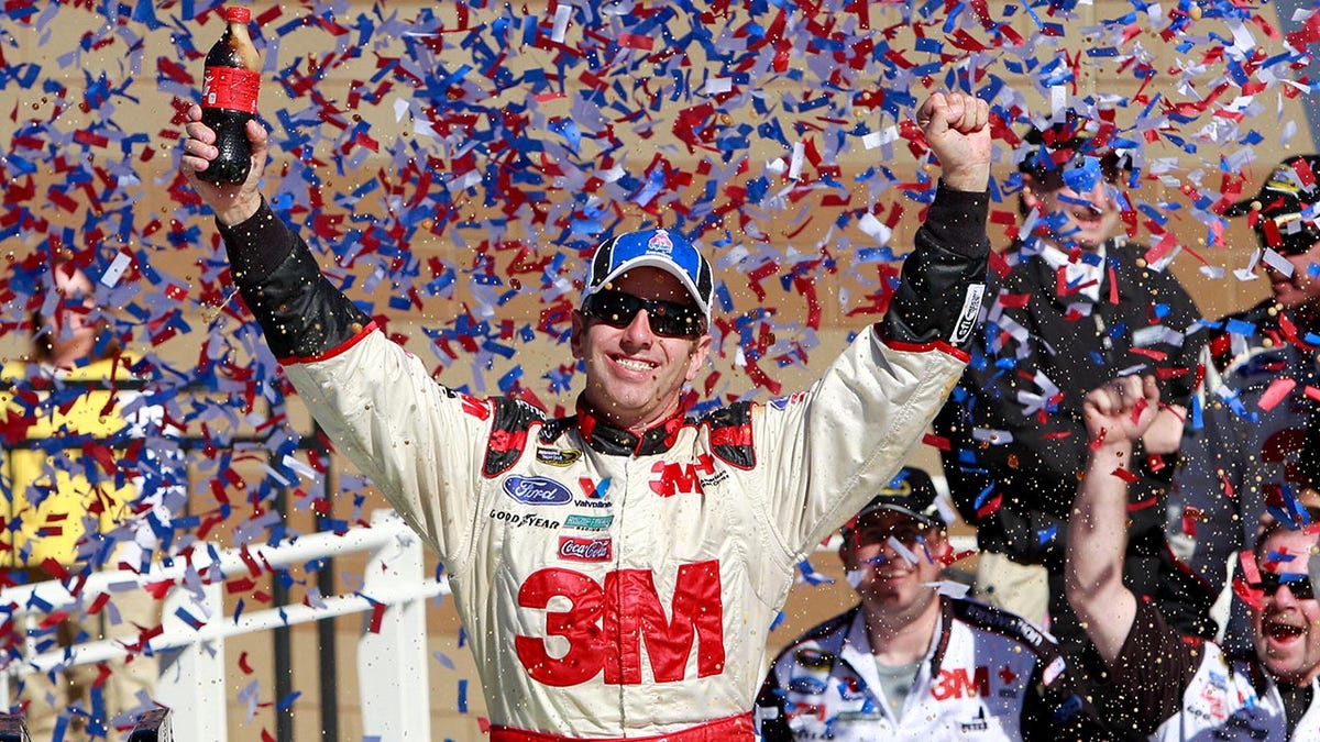Greg Biffle celebrates win