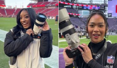 Two women stand on football fields, each smiling and holding a professional camera with a large lens. Both wear media credentials and jackets, with stadium seats and NFL branding visible in the backgrounds.