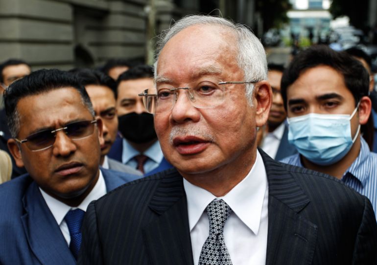 Malaysia's former Prime Minister Najib Razak speaks to his supporters.