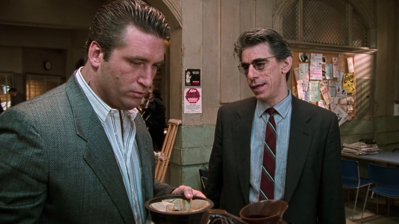 Detectives Beau Felton (Daniel Baldwin) and John Munch (Richard Belzer) go over a case in Homicide: Life on the Street