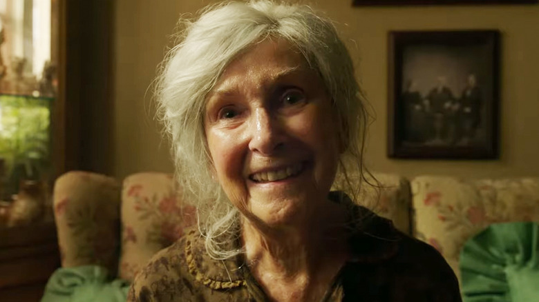 Joan Gregson's Ingrid Kirsh smiles as she sits in her living room in It Chapter Two