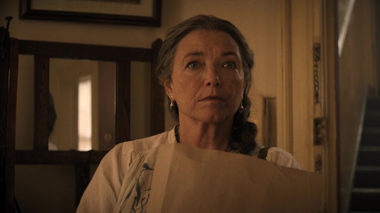 Marion holding a bag of groceries in Indiana Jones and the Dial of Destiny