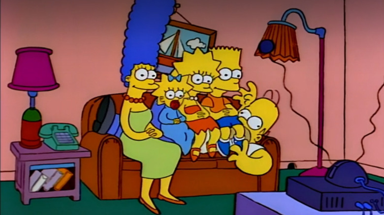 The Simpsons sit on Homer in this couch gag