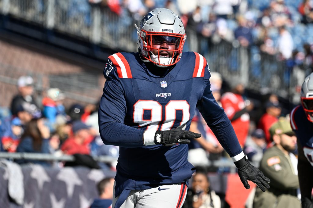 New England Patriots defensive tackle Christian Barmore (90) warms up prior to the game against the Atlanta Falcons at Gillette Stadium on November 2, 2025. 