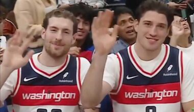 Ryan Leonard and Pierre-Luc Dubois, looking like a father and son, attend Washington Wizards game